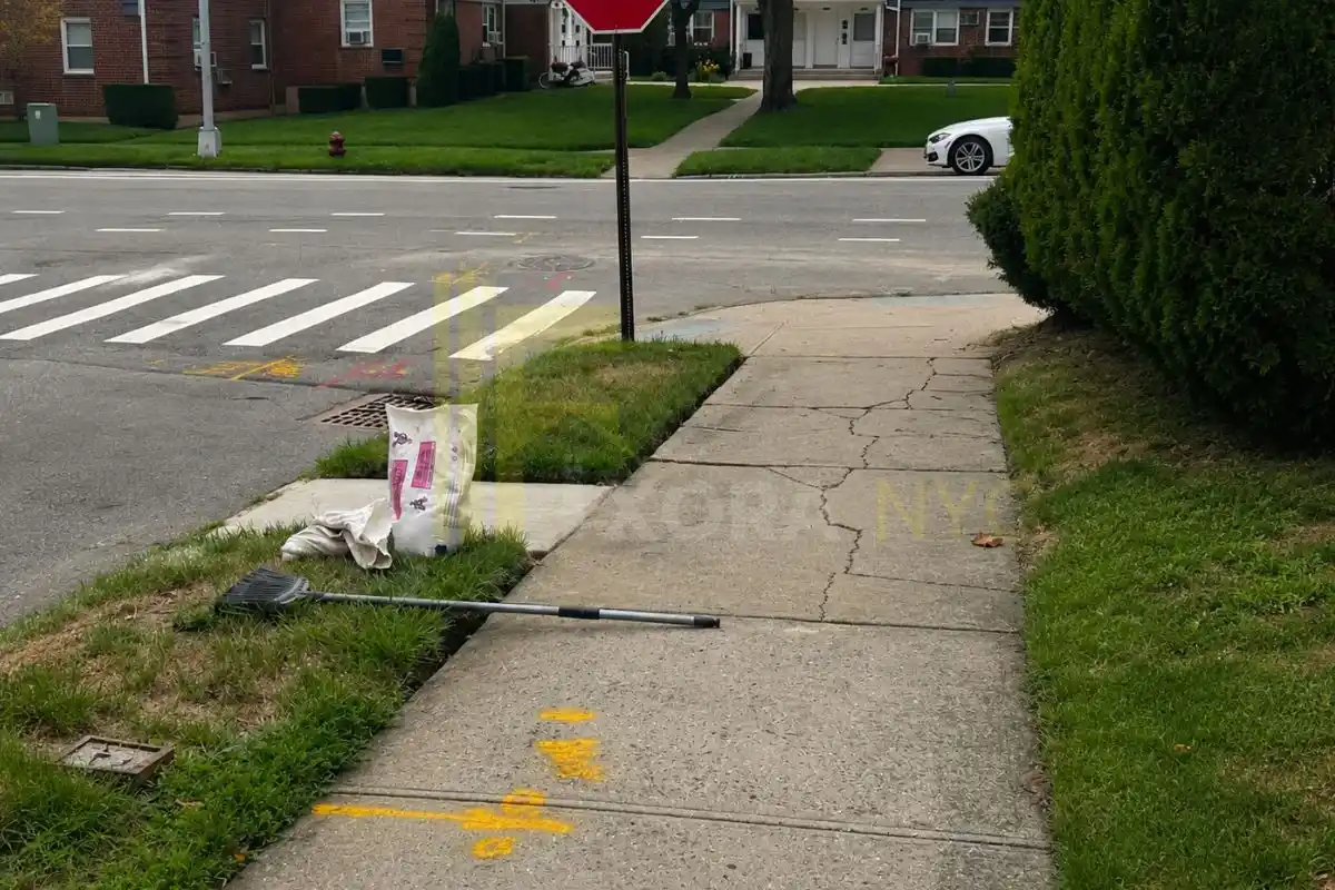 Cracked concrete sidewalk with visible damage requiring sidewalk repair and replacement services.